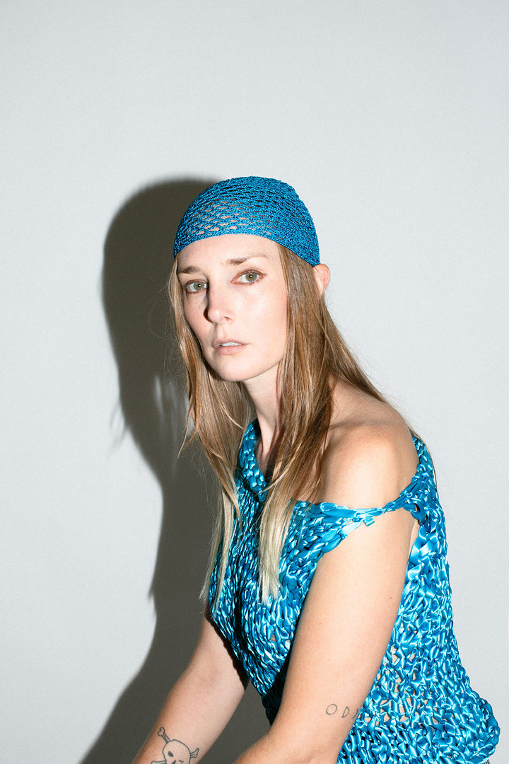 Nia Thomas - Teal Crochet Cap – BONA DRAG