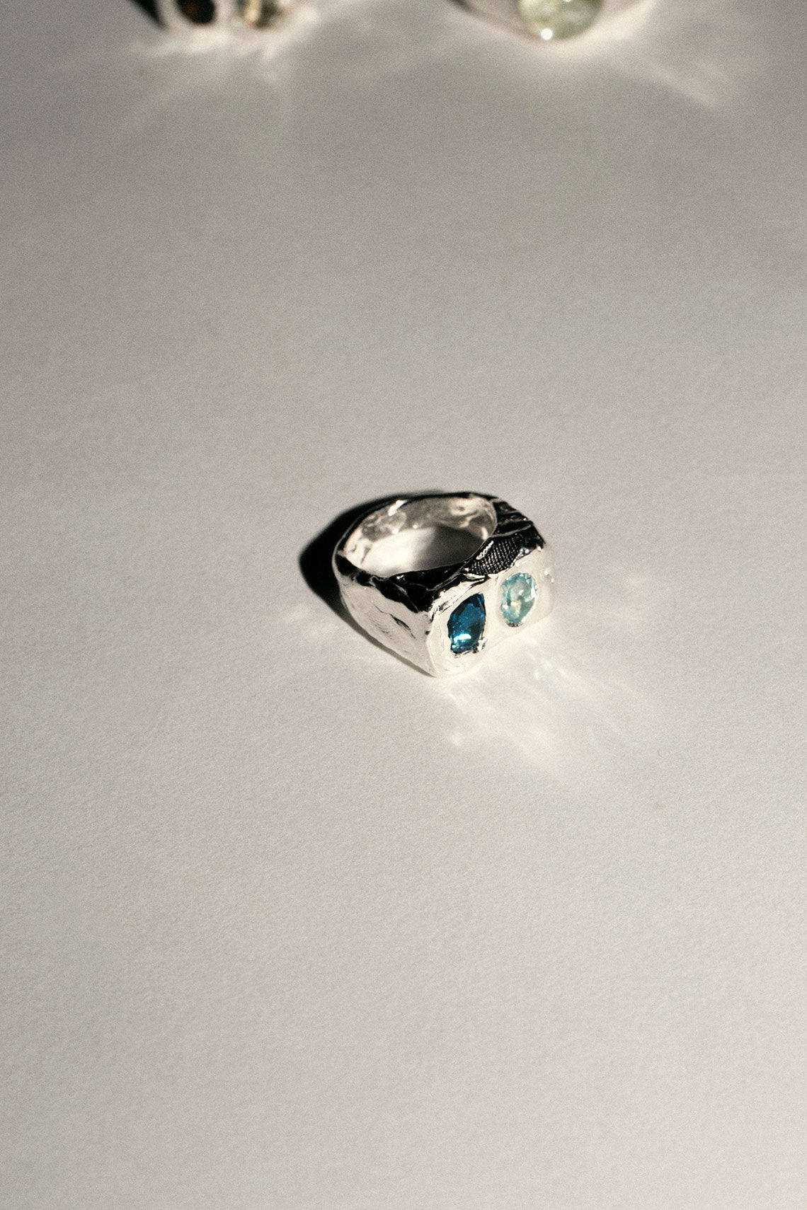 Silver with Blue Topaz Buzo