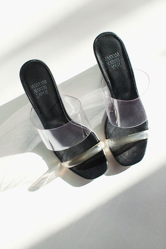 Maryam nassir zadeh logo embossed soles of the olympia wedge sandal