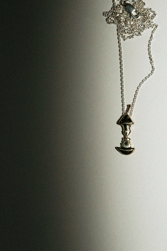 Brass Faces In The Pear Necklace