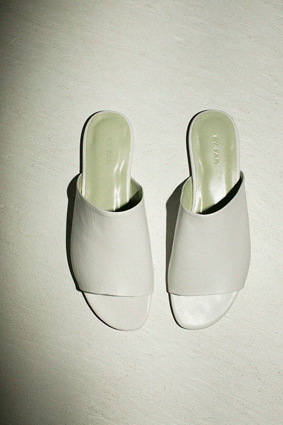 White slide sandals by By Far shoes