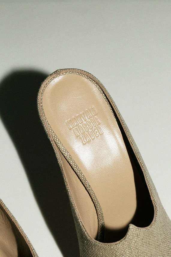 Maryam Nassir Zadeh embossed logo on the sole of the moira mules