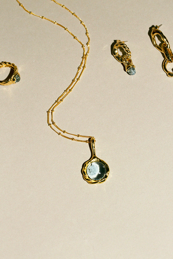 Gold Braid Blue Stone Pendant