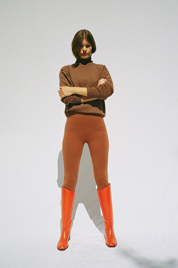 maryam nassir zadeh poppy canyon boot styled with Baserange leggings and sweatshirt