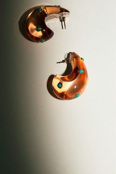Acrylic teardrop arp earrings by Lizzie Fortunato with a post back